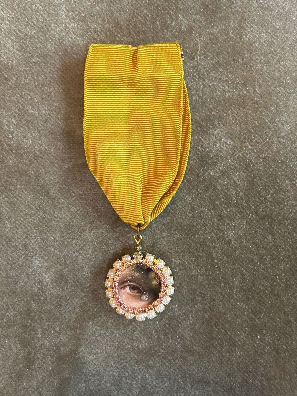 Handmade Yellow Ribbon Brooch with Pink Crystal Lover’s Eye Charm